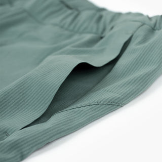 detail view of the side pocket of the ciele athletics CCPants unisex running pants from the Lifestyle Edition collection, in silver pine color