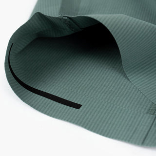 detail view of the leg insert at the bottom of the ciele athletics CCPants unisex running pants from the Lifestyle Edition collection, in silver pine color