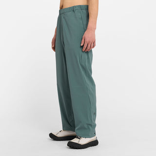 side view of ciele athletics CCPants unisex running pants from the Lifestyle Edition collection, in silver pine color, on a model