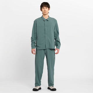 picture of the ciele athletics CCPants unisex running pants from the Lifestyle Edition collection, in silver pine color, worn with the CCJacket in the silver pine color, on a model