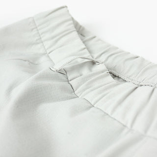 detail view of the elastic waistband of the ciele athletics CCPants unisex running pants from the Lifestyle Edition collection, in light grey color