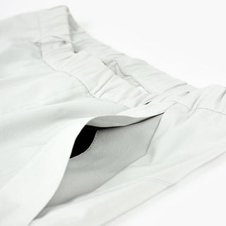 detail view of the side pocket of the ciele athletics CCPants unisex running pants from the Lifestyle Edition collection, in light grey color