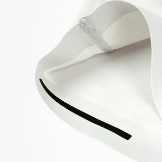 detail view of the leg opening of the ciele athletics CCPants unisex running pants from the Lifestyle Edition collection, in light grey color