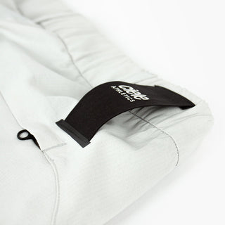 detail view of the back loop  of the ciele athletics CCPants unisex running pants from the Lifestyle Edition collection, in light grey color