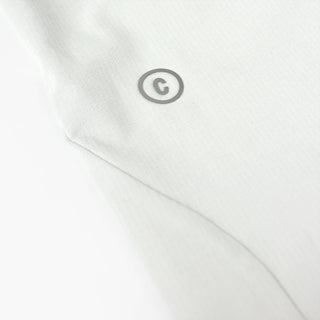detail view of the C printed logo of the ciele athletics CCPants unisex running pants from the Lifestyle Edition collection, in light grey color