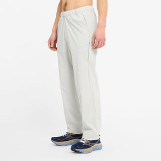 side view of ciele athletics CCPants unisex running pants from the Lifestyle Edition collection, in light grey color, on a model