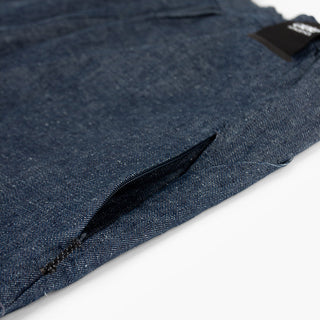 detail view of the hidden zippered pocket of the ciele athletics WRKShort unisex running and technical short from the Lifestyle Edition collection, in denim indigo color