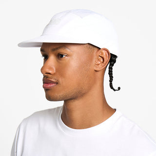 side view of the ciele athletics GOCap unisex running hat in ghost color, on a model