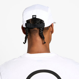 back view of the ciele athletics GOCap unisex running hat in ghost color, on a model