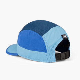 back view of the ciele athletics GOCap unisex running hat with a curved brim in dusty blue color