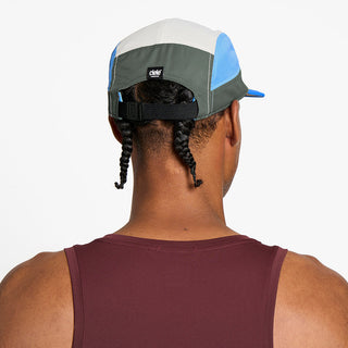 back view of the ciele athletics GOCap unisex running hat in seaweed color, on a model