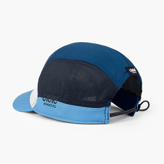 back view of the ciele athletics FTSCap unisex running hat in white cobalt color