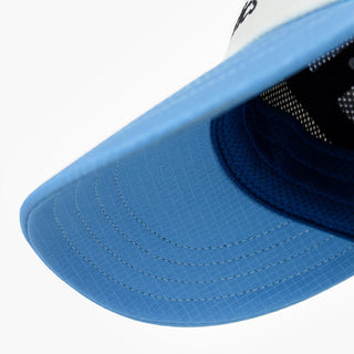 underbrim view of the ciele athletics FSTCap unisex running hat in white cobalt color