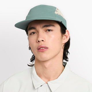 front view of ciele athletics GOCap longbrim unisex running hat with longer brim from the Lifestyle Edition collection, in silver pine color, on a model